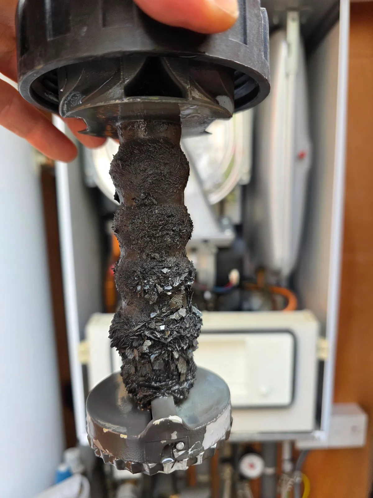 MAK Plumbing servicing a Vaillant boiler installation in Fulham — filter cleaning