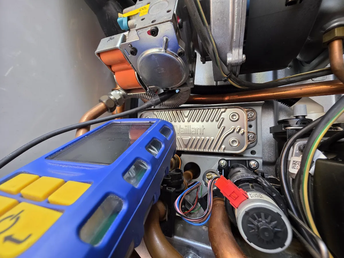 Disturbed joints in the boiler being checked for leaks during service