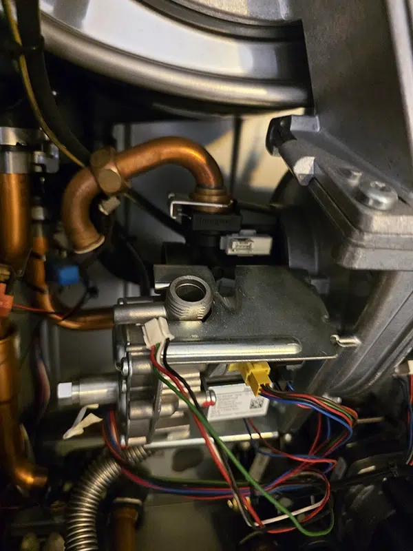 Gas Safe engineer diagnosing a boiler breakdown with no heating or hot water in Streatham, South West London