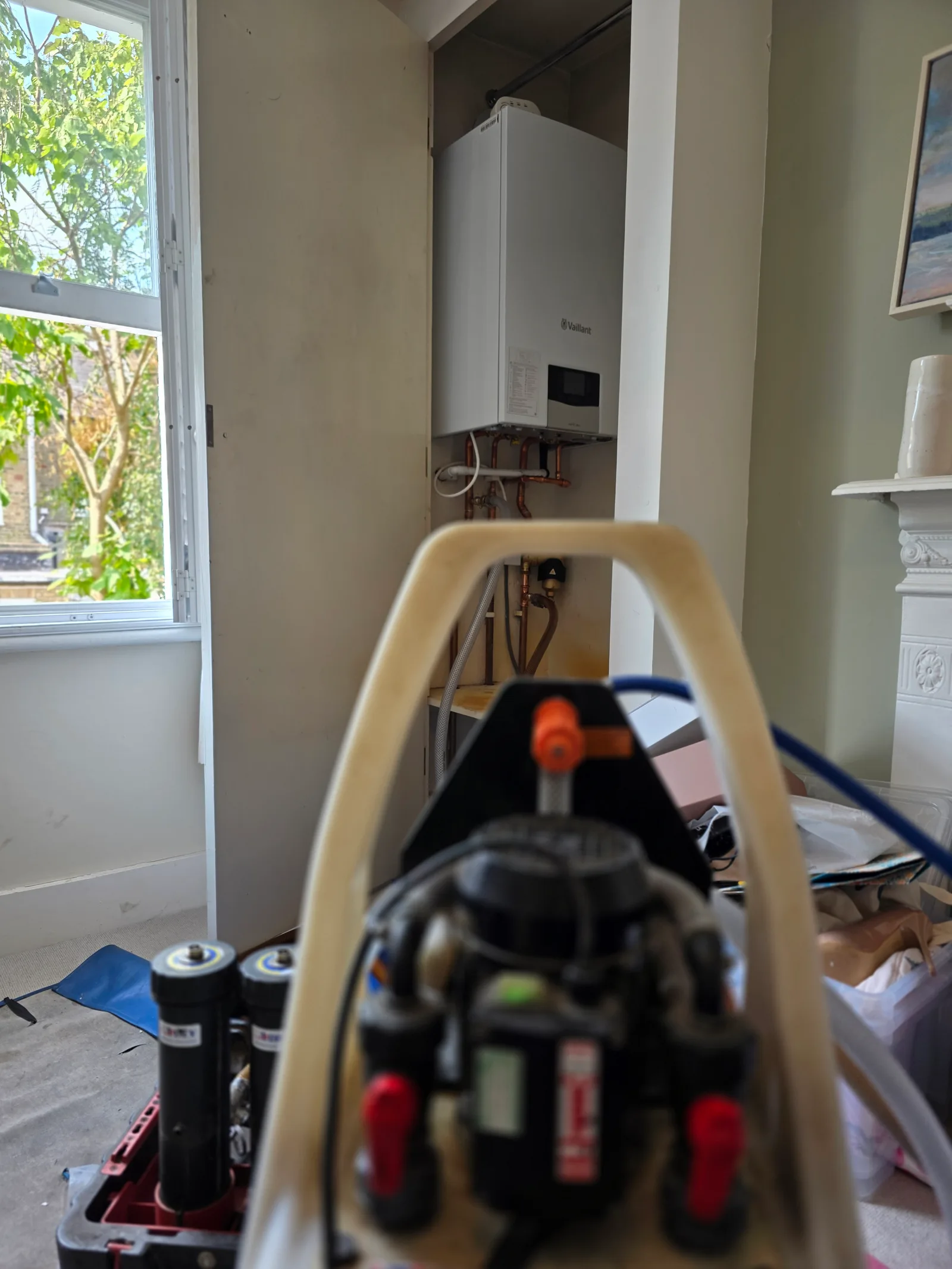 Power flushing the central heating system after the new Vaillant boiler installation in Clapham