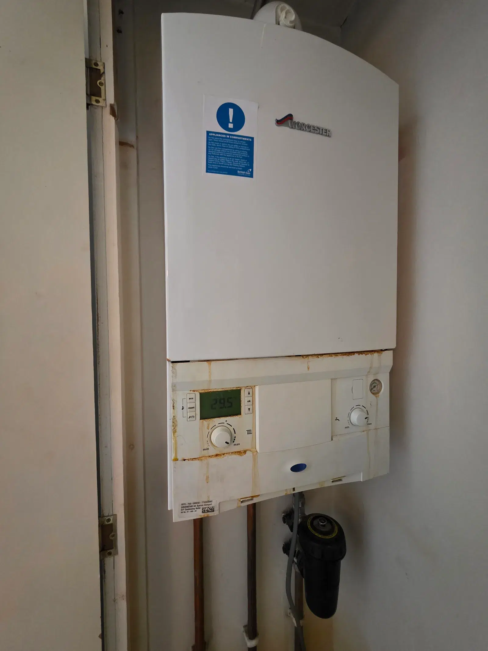 Corroded Worcester Bosch boiler covered in rust stains before replacement in Clapham SW4