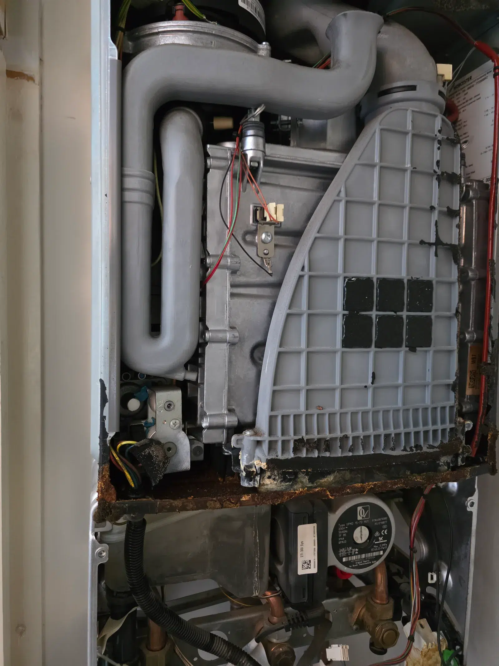 Worcester Bosch heat exchanger and chassis showing severe corrosion beyond repair