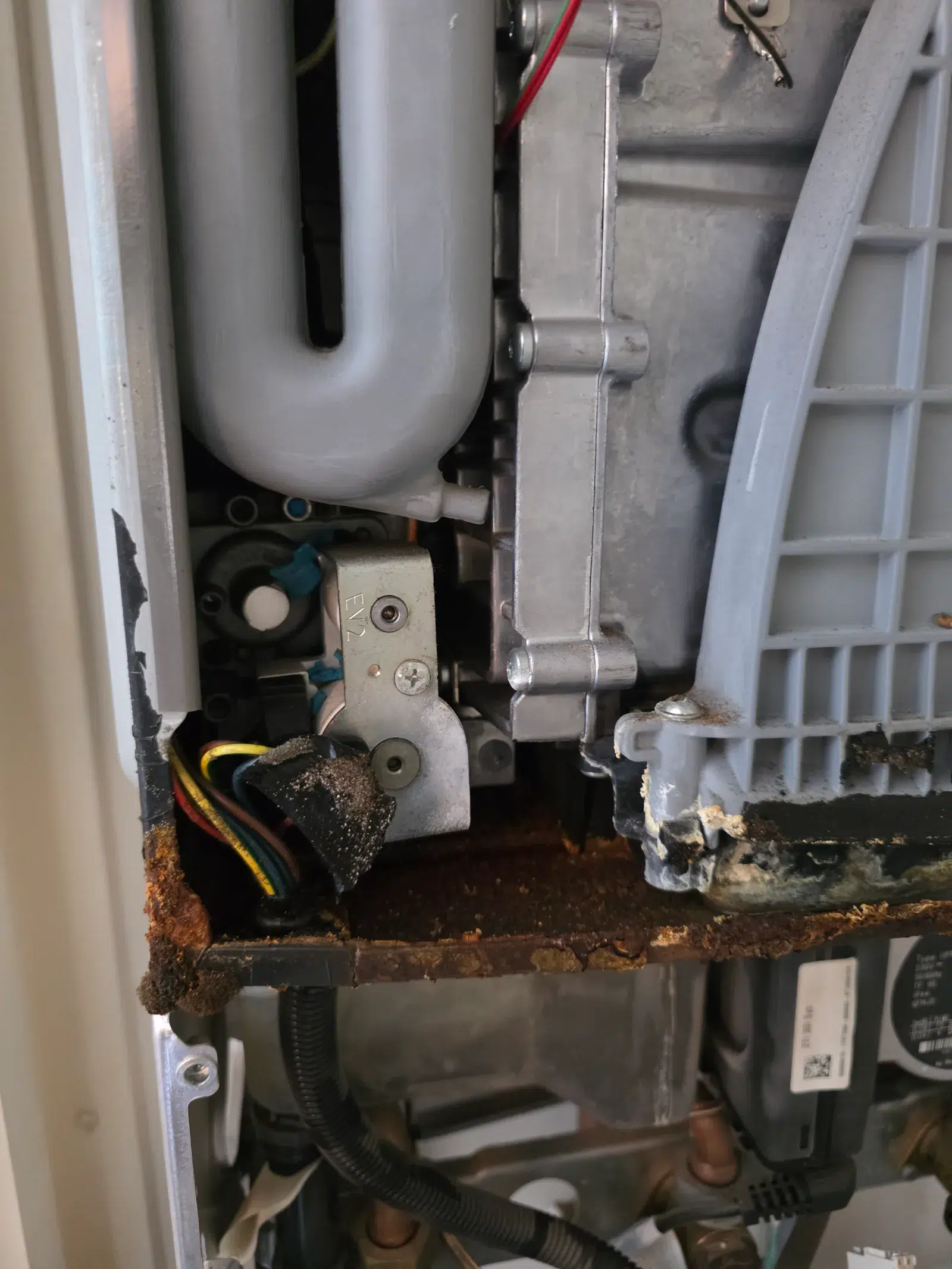 Close-up of rust damage inside the condemned Worcester Bosch boiler
